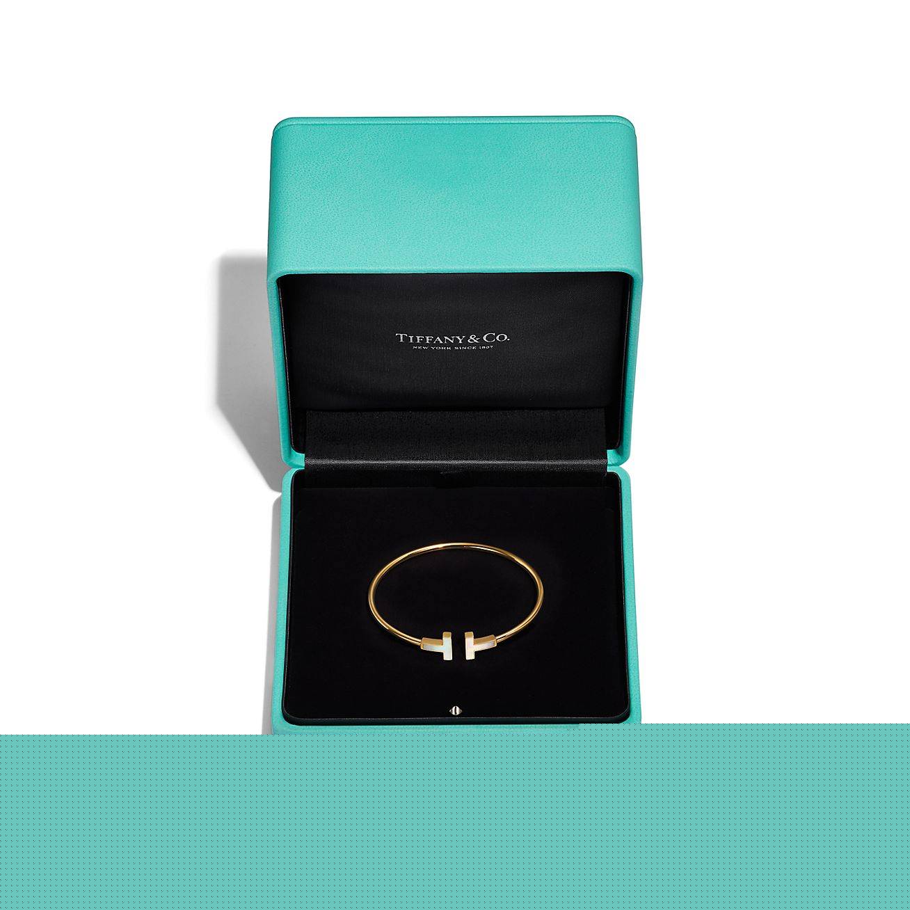 T*f*ny t wire bracelet in yellow gold with mother-of-pearl